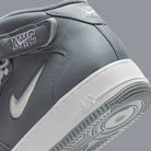 NIKE Air Force 1 Mid QS - Scarpe